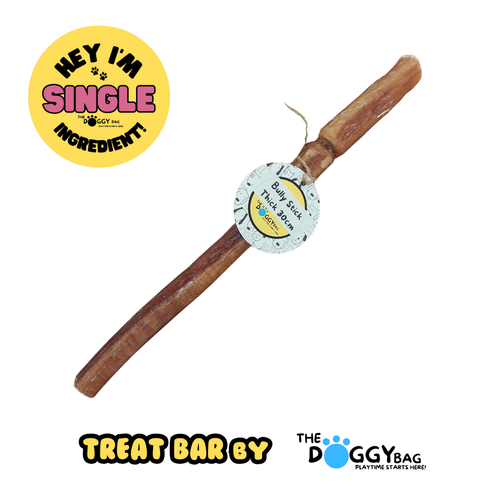 Dog chew Bully stick with label on a white background, featuring 'The Doggy Bag' brand.