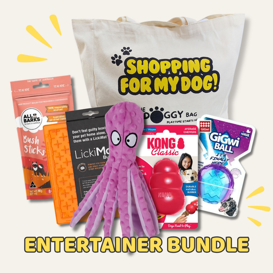 Dog entertainment bundle with toys and a tote bag on a white background