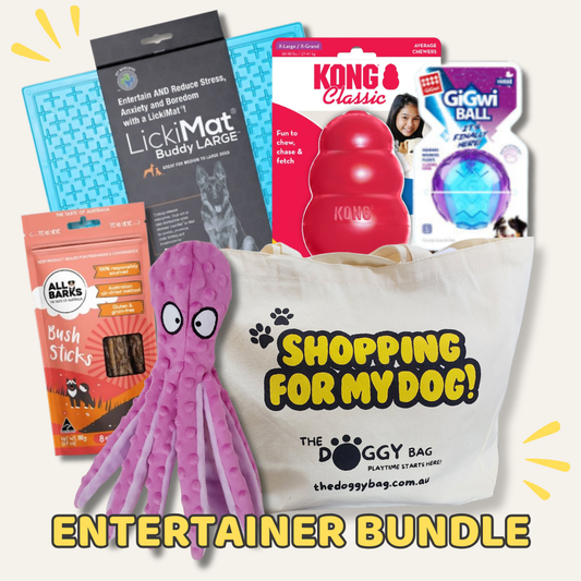 Dog toys and products with a 'The Doggy Bag' bag labeled 'Shopping for My Dog!' on a light background.