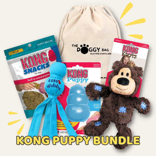 Kong Puppy Bundle with toys and snacks on a white background