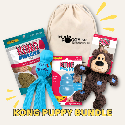 Kong Puppy Bundle with toys and snacks on a white background