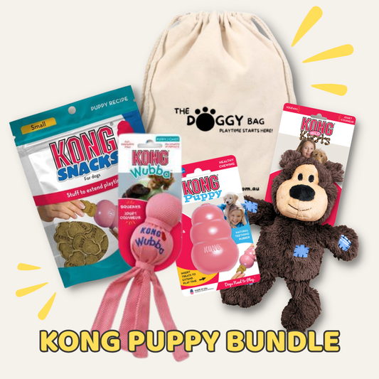 Kong Puppy Bundle with toys and snacks on a white background