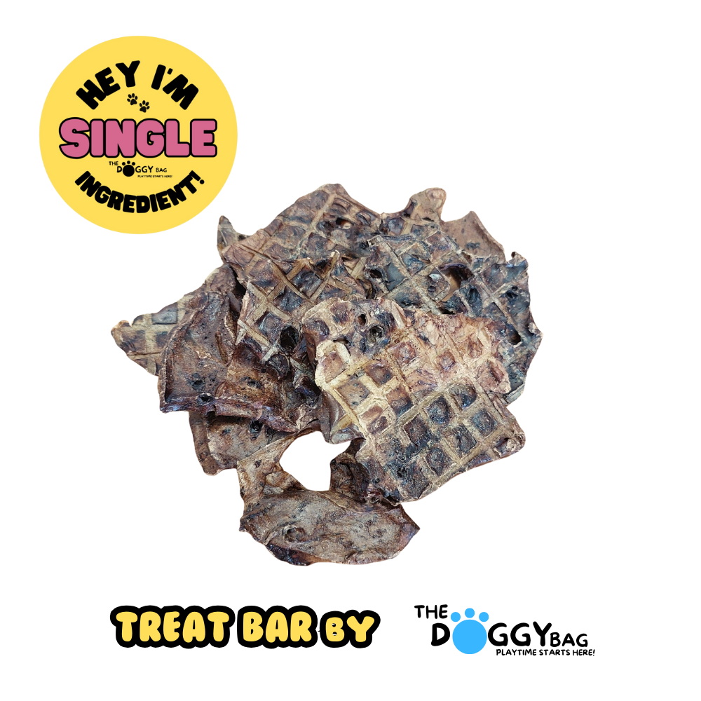 Dog treat bar with 'Hey I'm Single Ingredient' label and 'The Doggy Bag' branding on a white background.
