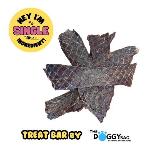 Dried pet treat with 'Hey I'm Single Ingredient' label and 'The Doggy Bag' branding on a white background.